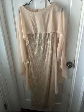 Elegant Sequined Evening Gown with Sheer Cape